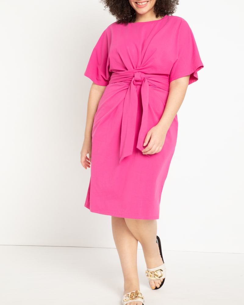 Front of a model wearing a size 14 Liberty Cross Front Dress in Pink by ELOQUII. | dia_product_style_image_id:195915